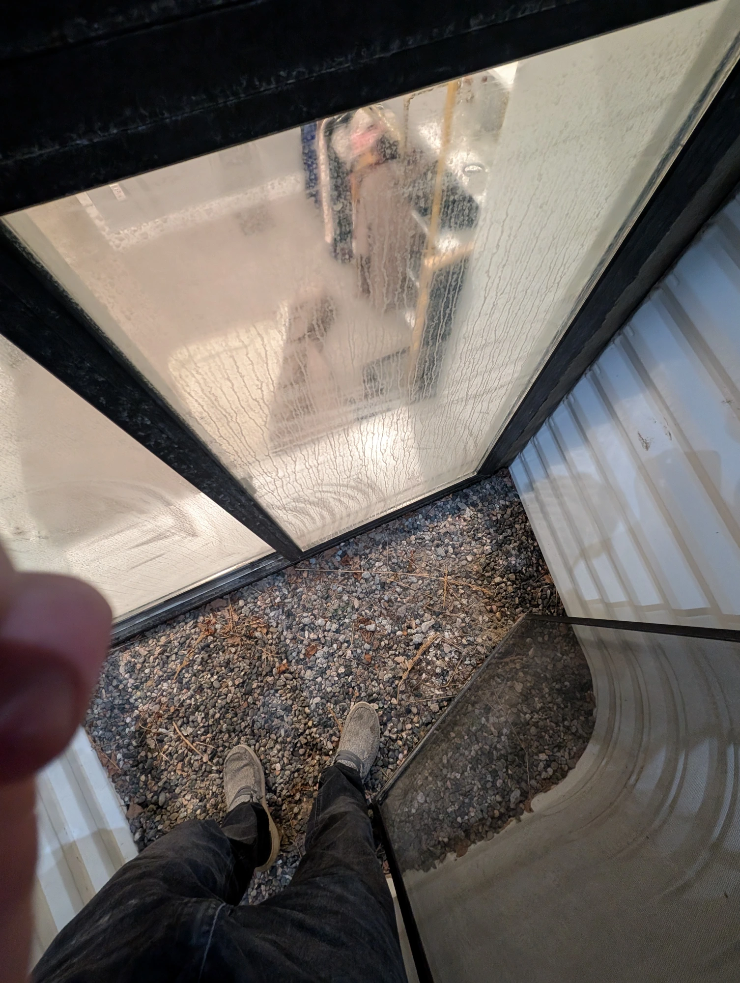 Before: hard-water stained, streaky window
