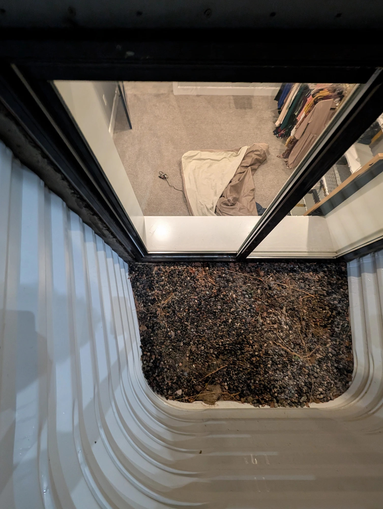 Crystal clear basement window after a Sky-High clean